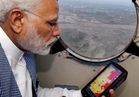Prime Minister Narendra Modi conducting an aerial survey of flood affected areas of Gujrat, Photo: H.T.